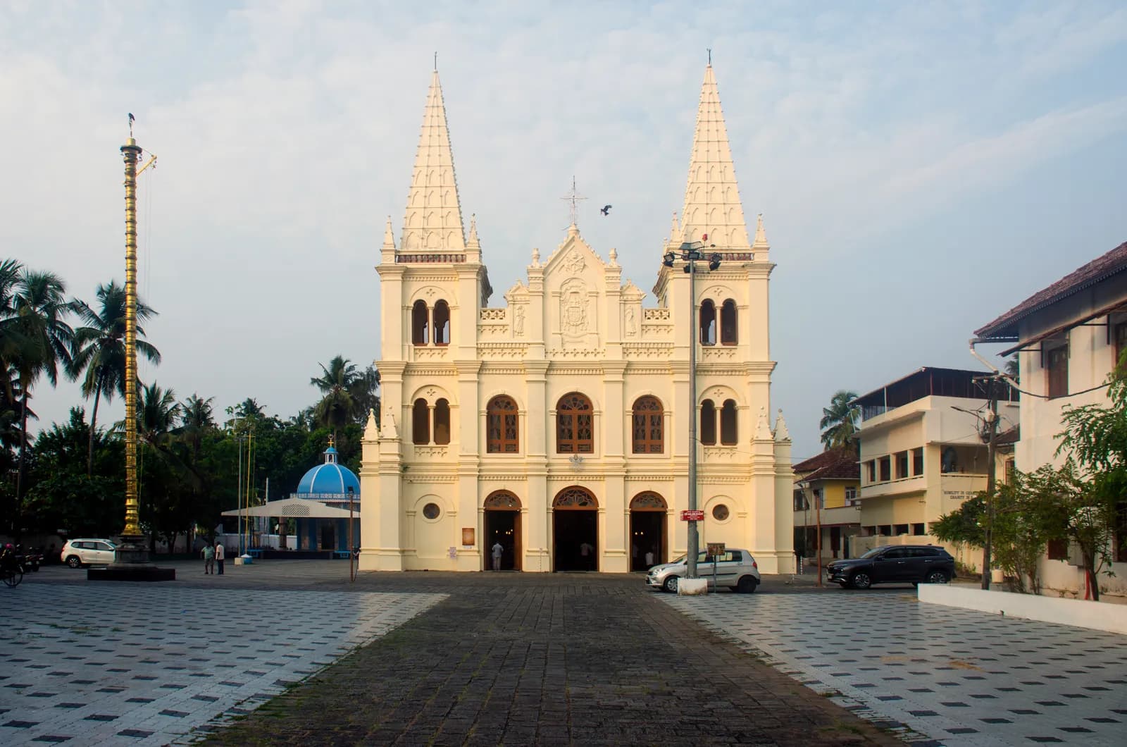 Twin-spired white facade of Santa Cruz Cathedral Basilica in Fort Kochi